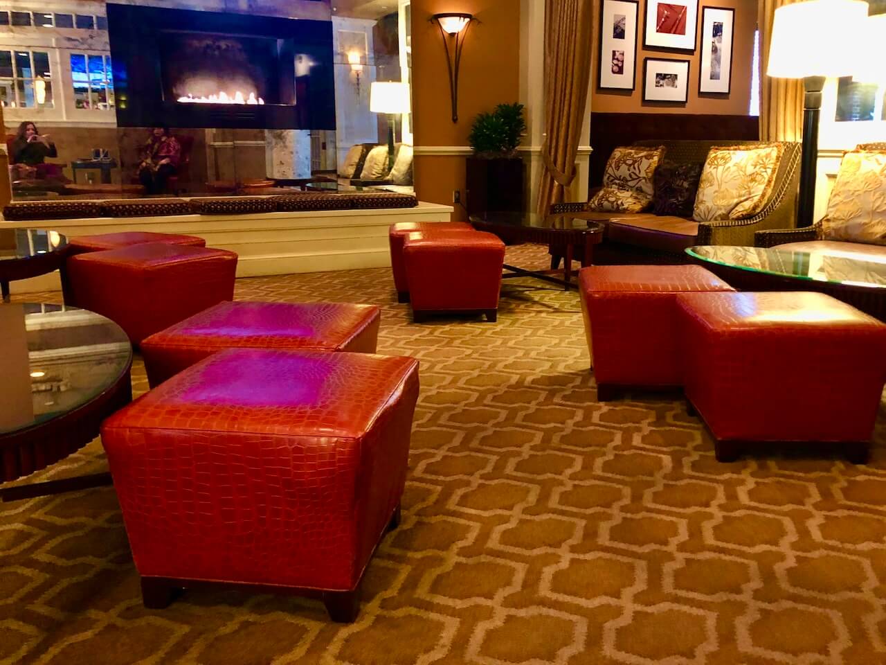 Red footstools in auburn hotel