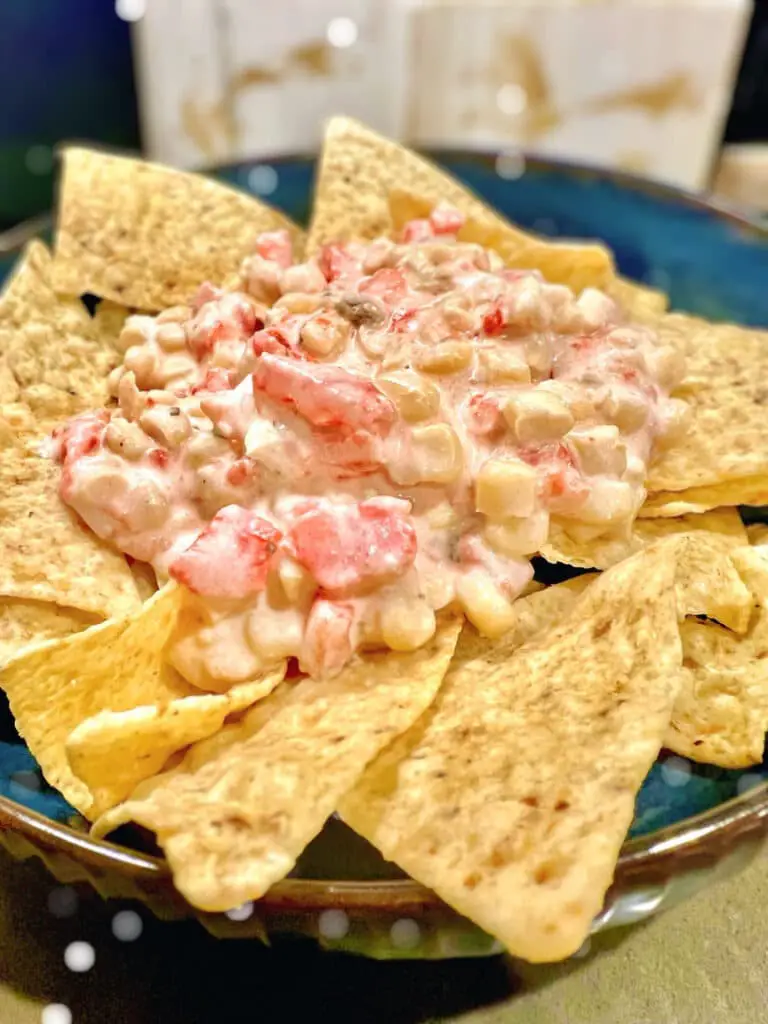 Creamy corn dip recipe served on tortilla chips