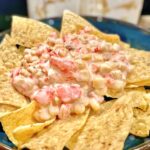 Creamy corn dip recipe served on tortilla chips