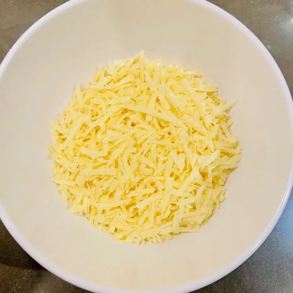 Shredded cheese in bowl