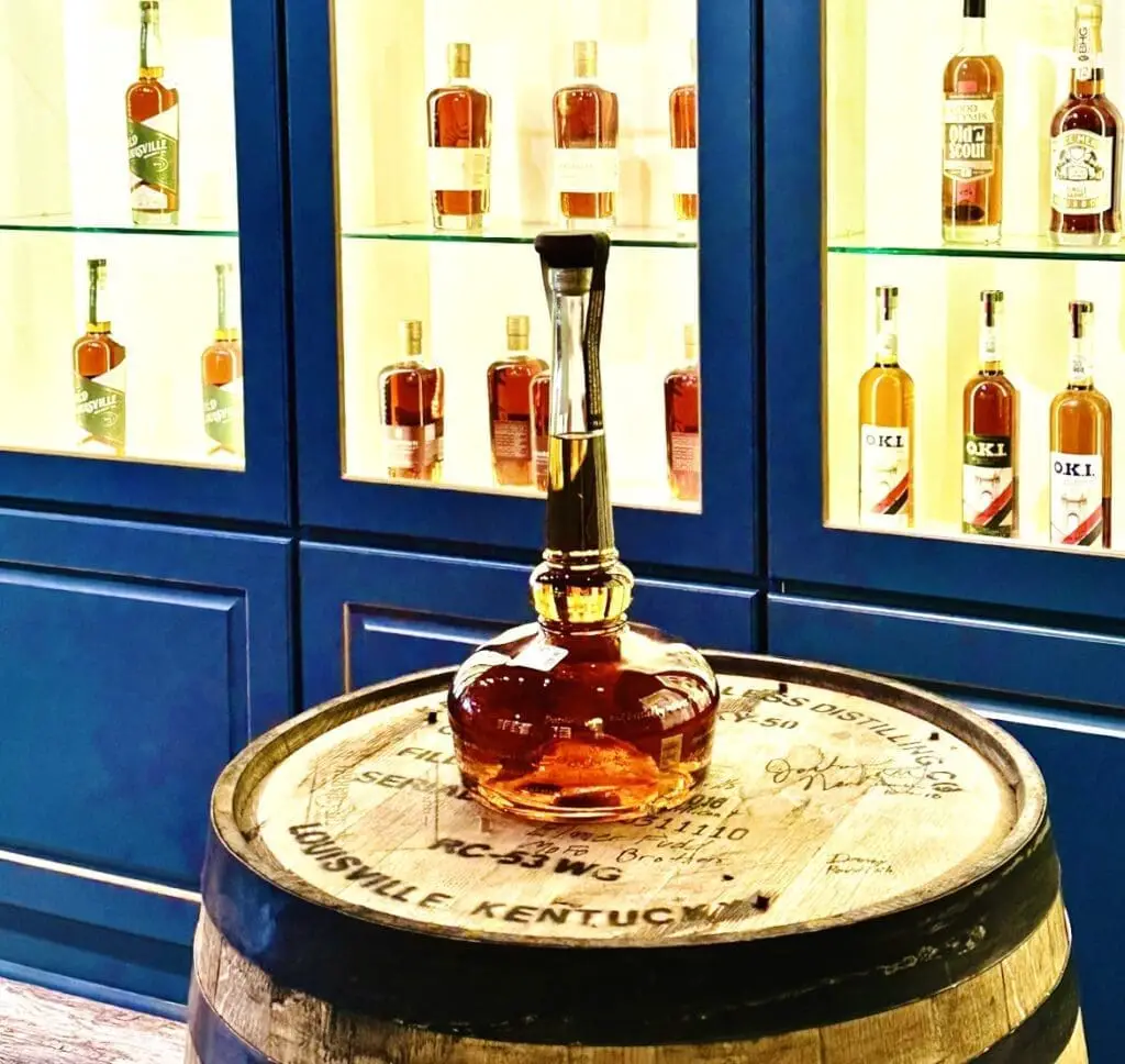 Bottle of Willett Bourbon on a barrel