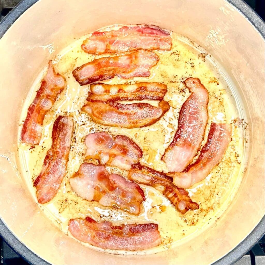 Bacon cooking in dutch oven